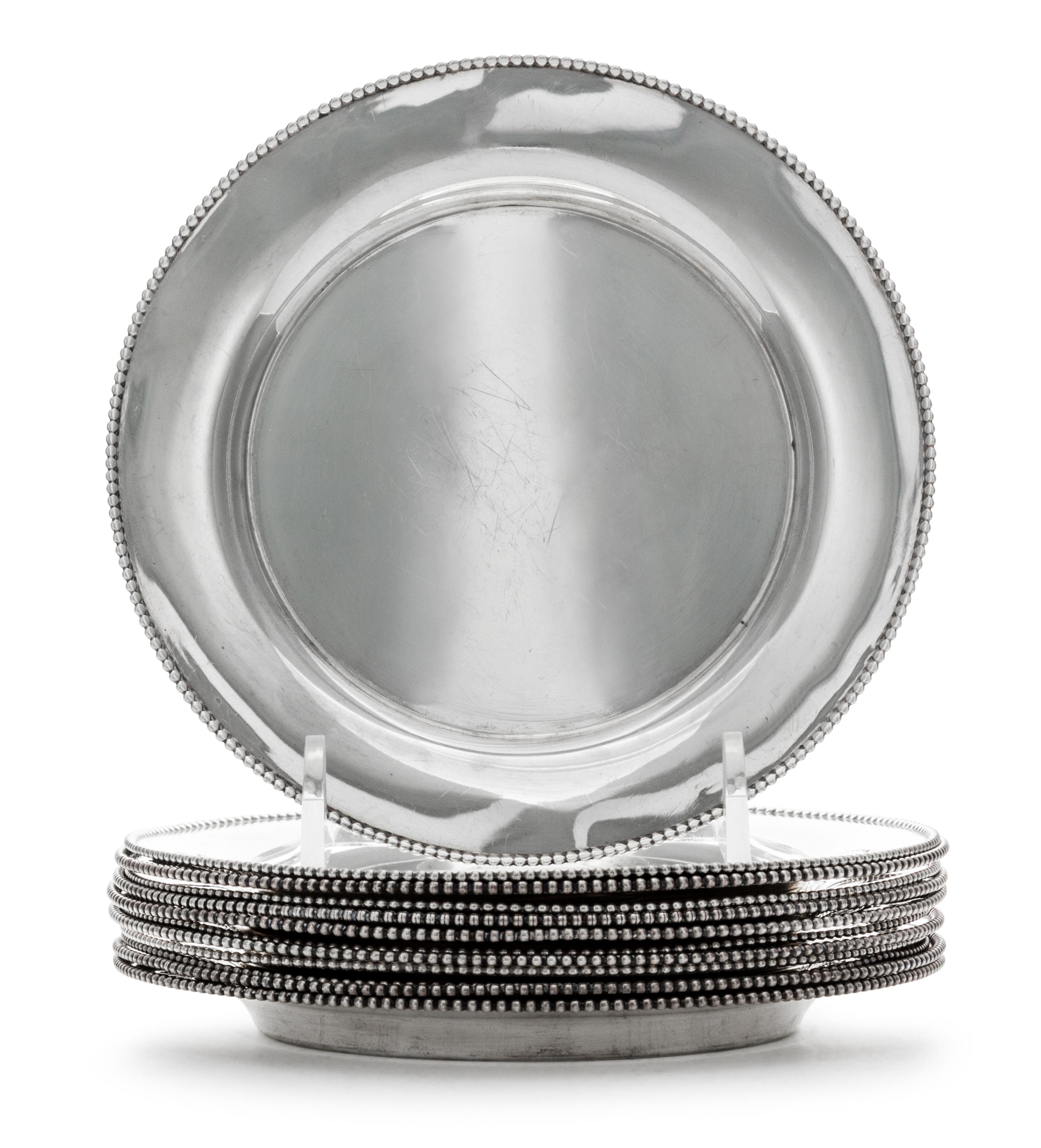 A Set of Twelve American Silver Bread Plates, Wallace Silversmiths, Wallingford, CT, 20th Century, each with beaded edge.