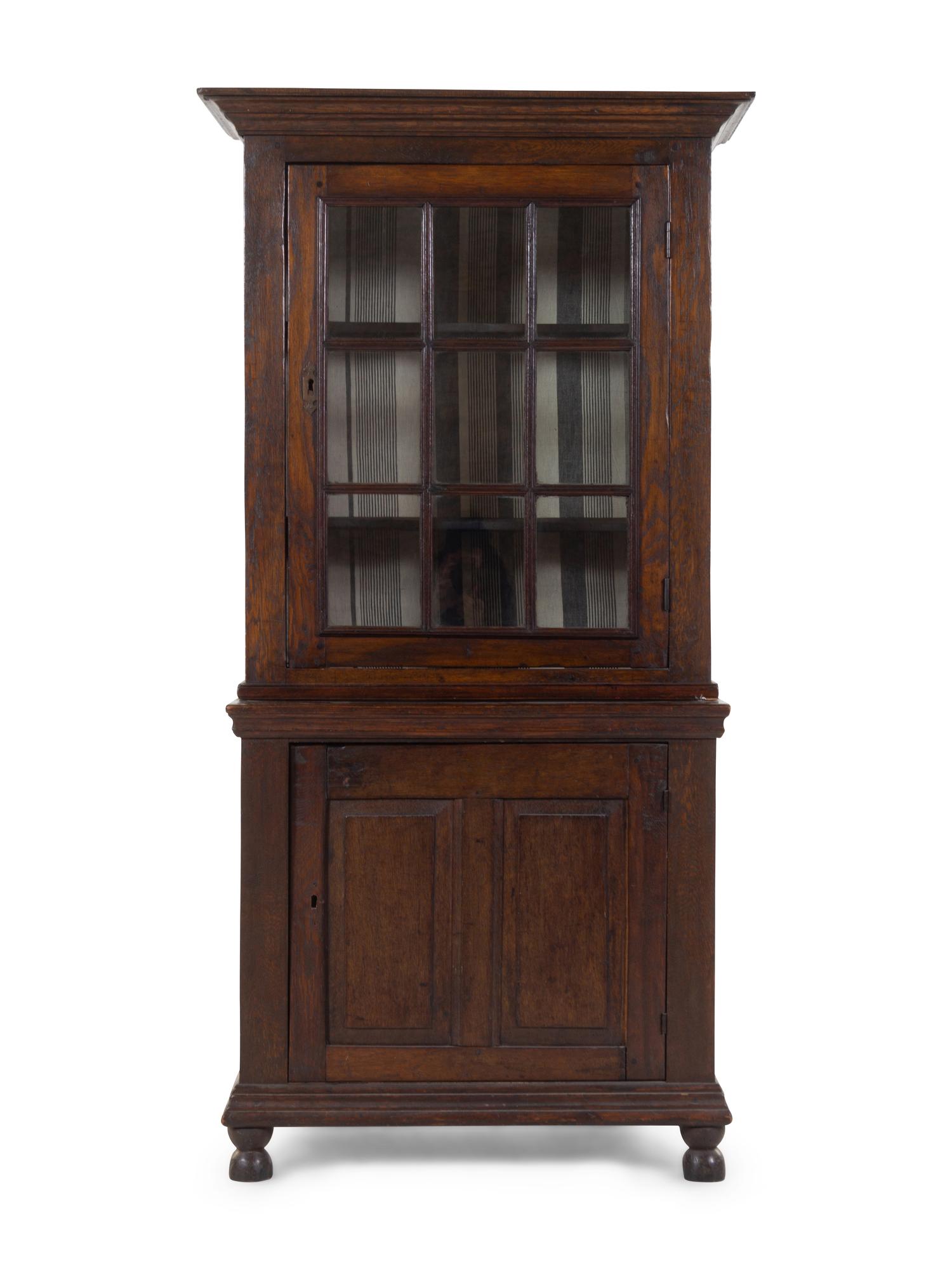 A French Provincial Step-Back Cupboard