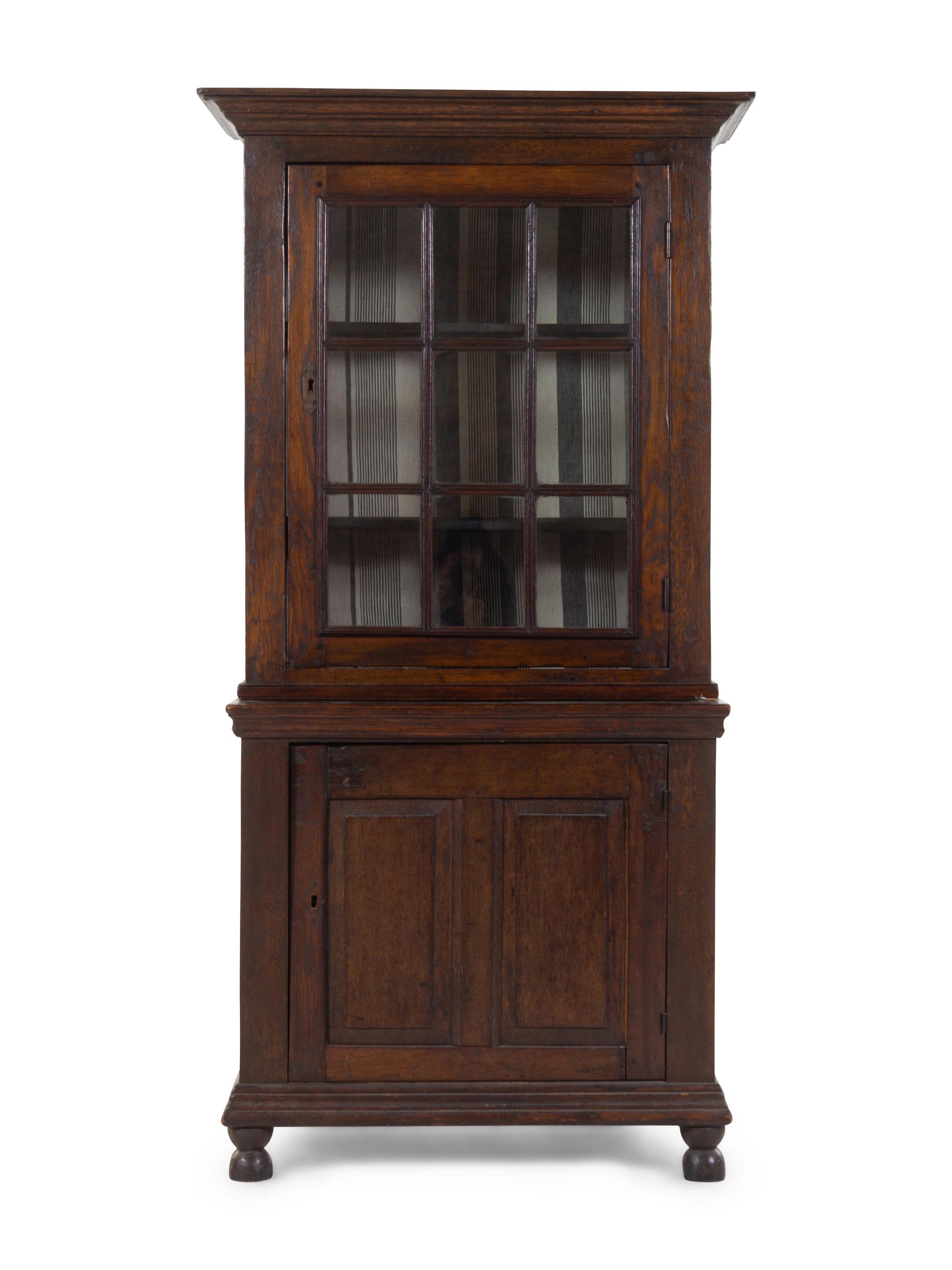 A French Provincial Step-Back Cupboard