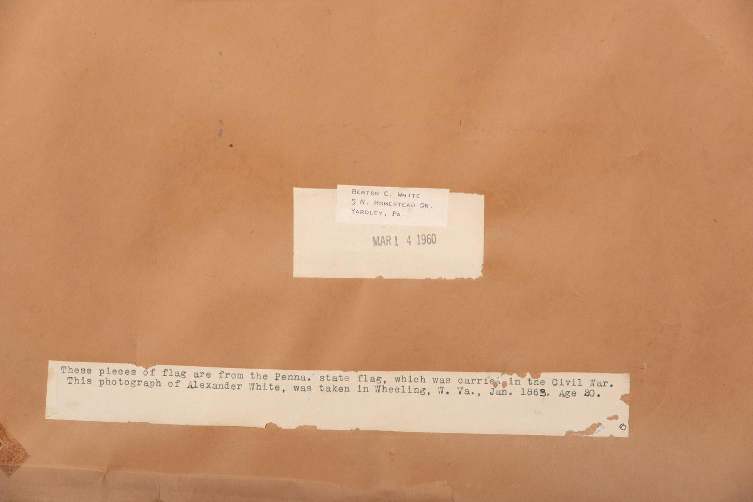 [CIVIL WAR]. Group of artifacts related to Alexander White, 82nd Pennsylvania Volunteer Infantry, including escutcheon, CDV portrait, and flag remnants.