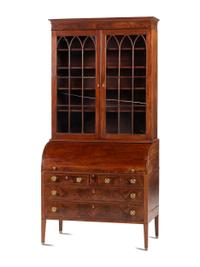 A Classical Mahogany Desk and Bookcase