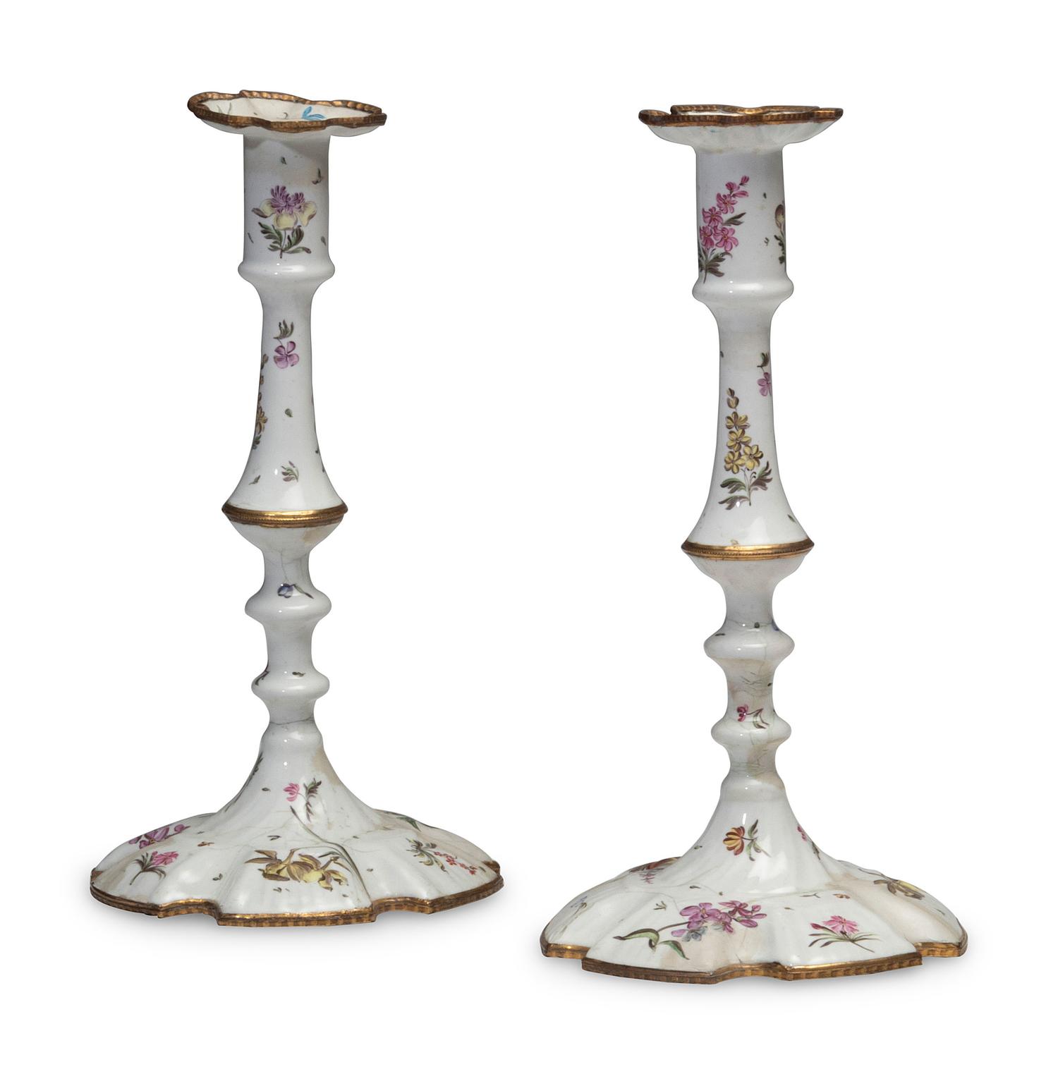A Pair of Battersea Enamel Candlesticks