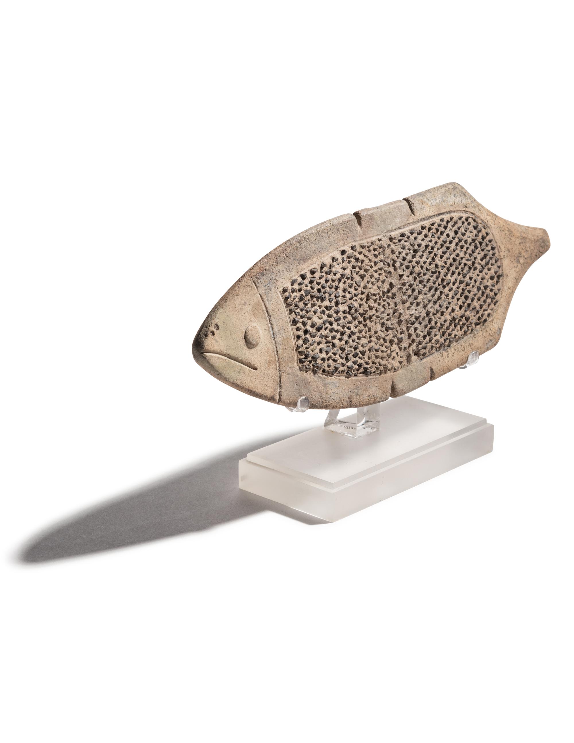 A La Tolita Pottery Grater in the Form of a Fish