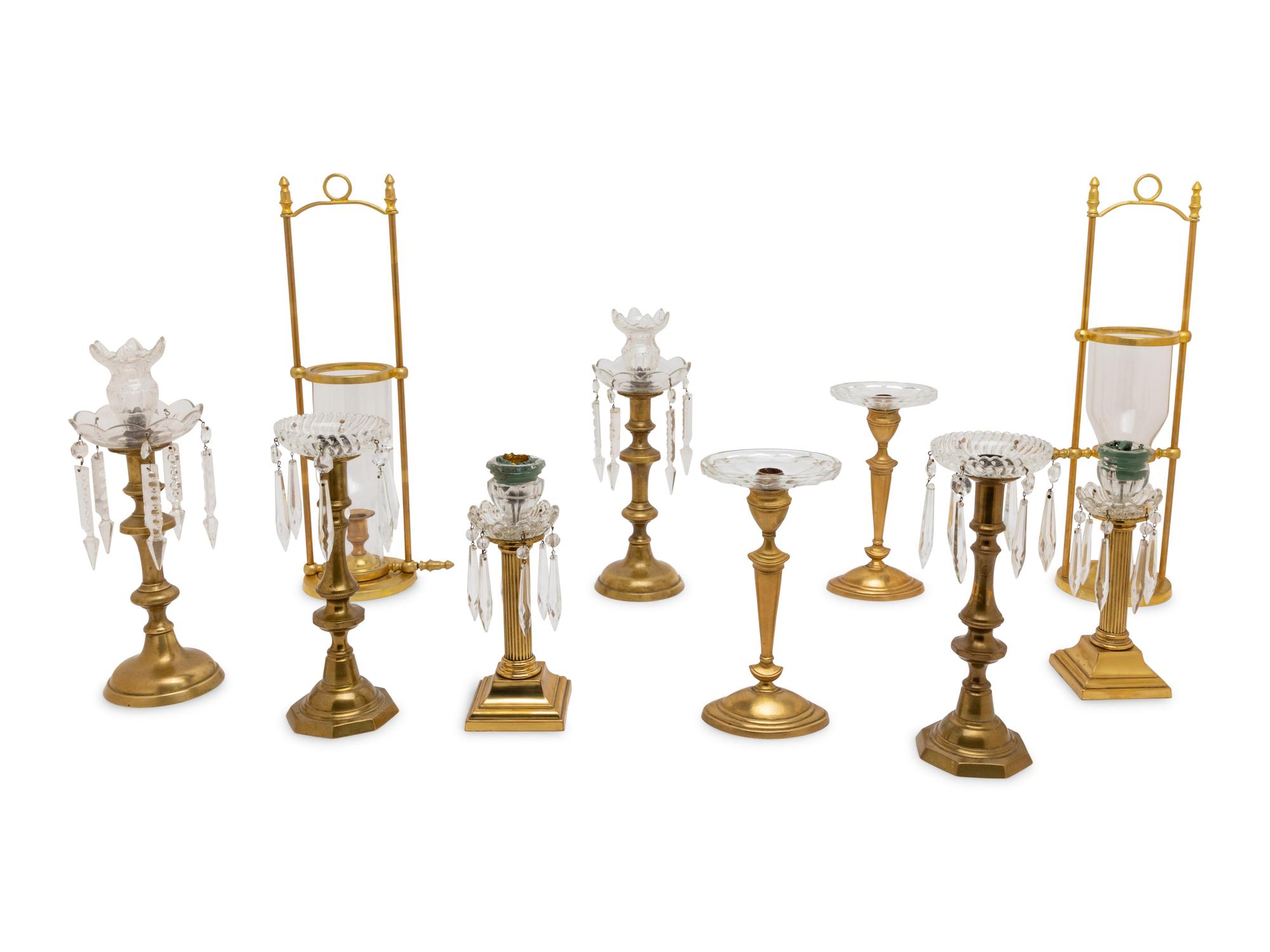 Five Pairs of Glass Mounted Brass Candlesticks