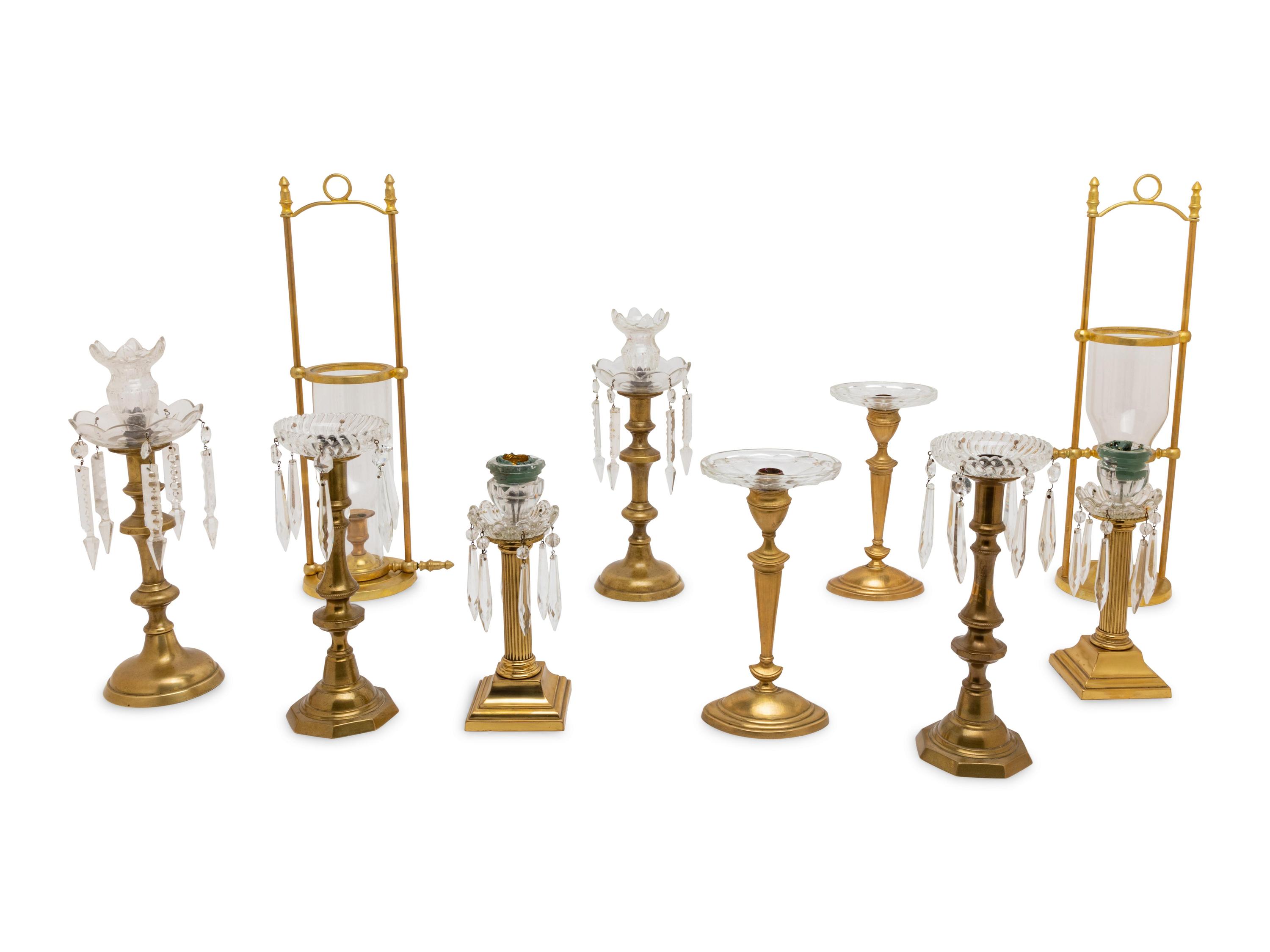 Five Pairs of Glass Mounted Brass Candlesticks