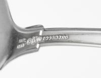 An American Silver Flatware Service, Gorham Mfg. Co., Providence, RI, Etruscan pattern, comprising: 11 dinner knives 11 dinner forks 12