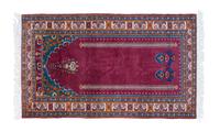 A Persian Prayer Rug 6 feet 4 inches x 3 feet 9 inches.