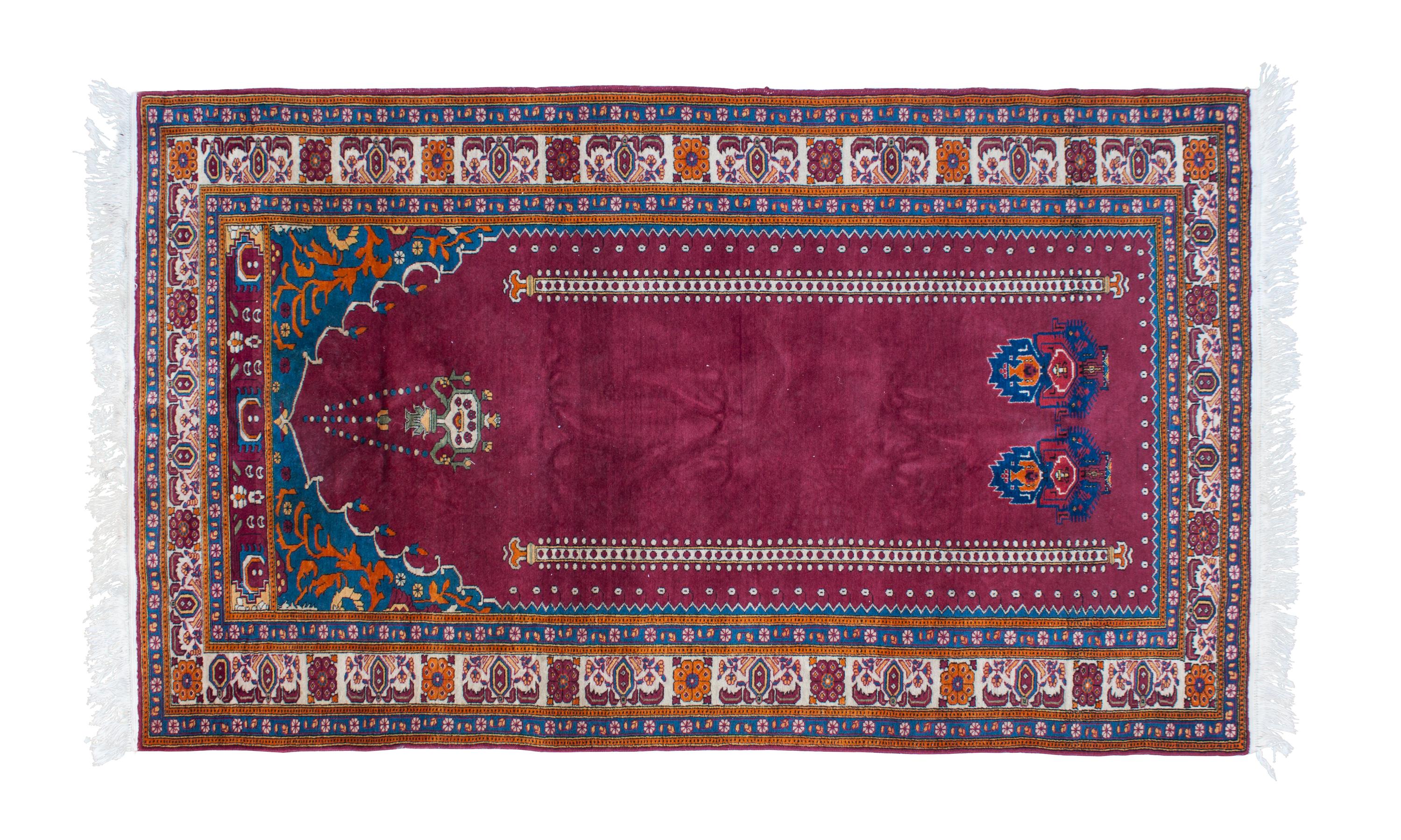 A Persian Prayer Rug 6 feet 4 inches x 3 feet 9 inches.