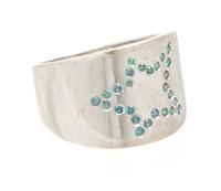 An 18 Karat White Gold and Colored Diamond Star Motif Ring, 4.30 dwts.