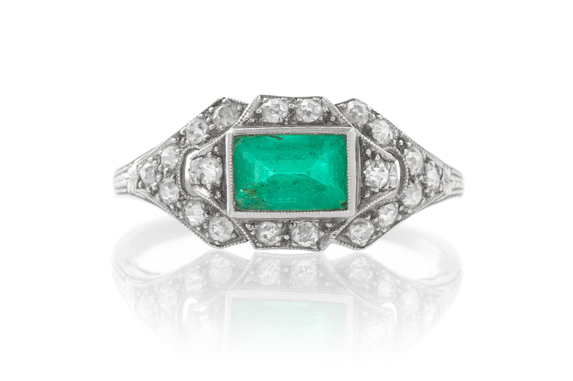 An Art Deco Platinum, Emerald and Diamond Ring, 2.40 dwts.