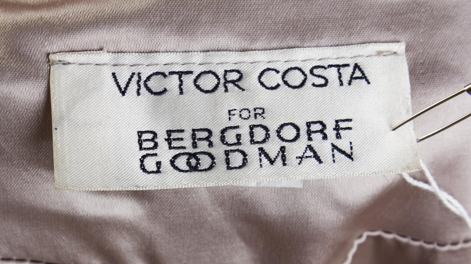 A Victor Costa Silver Sequin Jacket, Size 10.