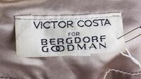 A Victor Costa Silver Sequin Jacket, Size 10.