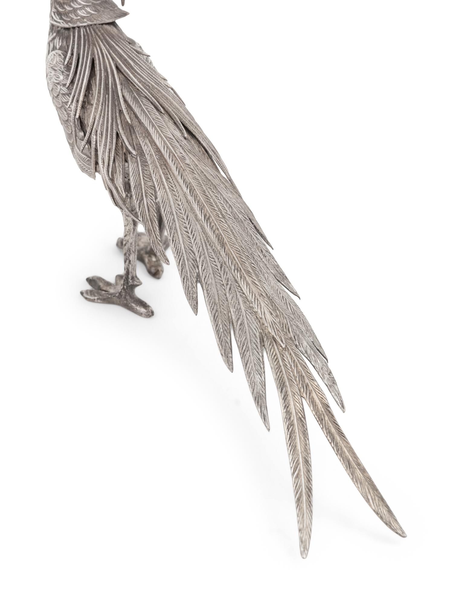 A Pair of Spanish Silver Pheasant Table Ornaments
