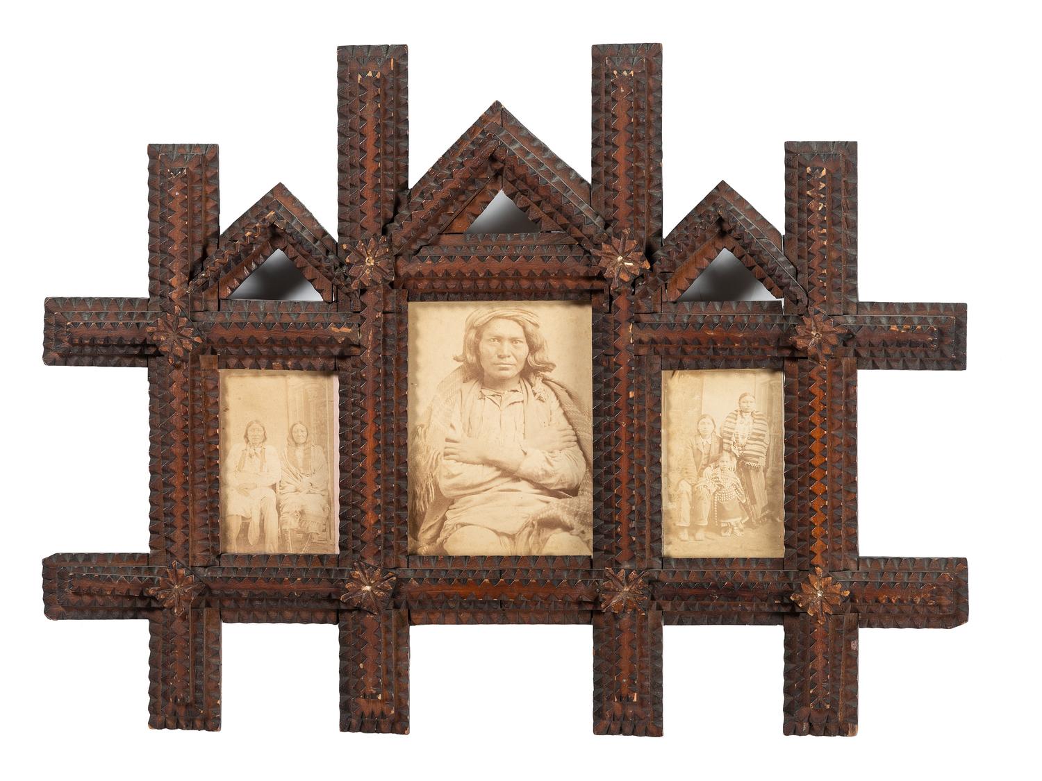 [NATIVE AMERICAN]. A group of 2 folk art carved frames containing photographs of Native American subjects.