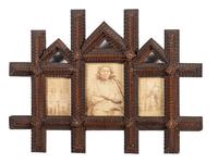 [NATIVE AMERICAN]. A group of 2 folk art carved frames containing photographs of Native American subjects.