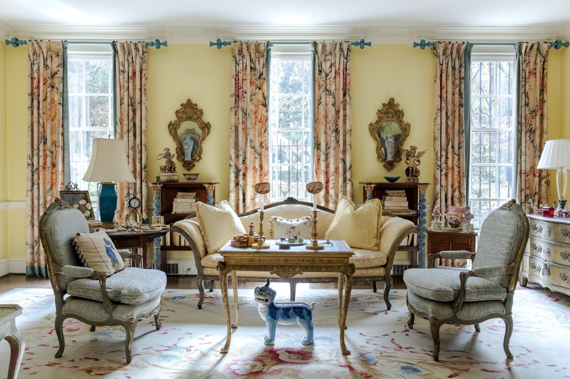 A Continental Empire Style Painted and Parcel-Gilt Mahogany-Veneered Kneehole Desk