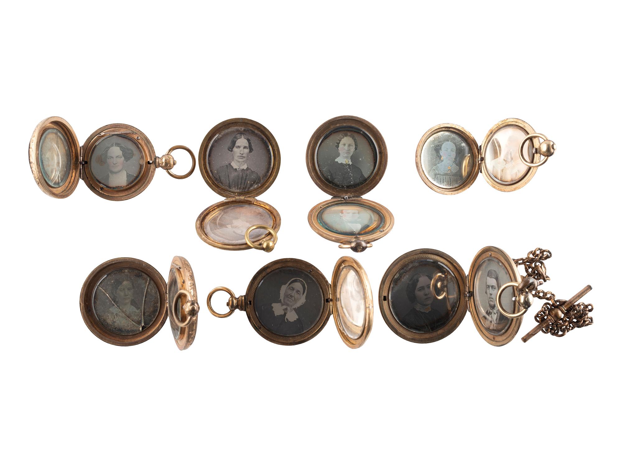 [EARLY PHOTOGRAPHY]. A group of 7 lockets containing 15 daguerreotype portraits.