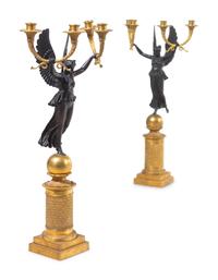 A Pair of Empire Style Gilt and Patinated Bronze Four-Light Candelabra