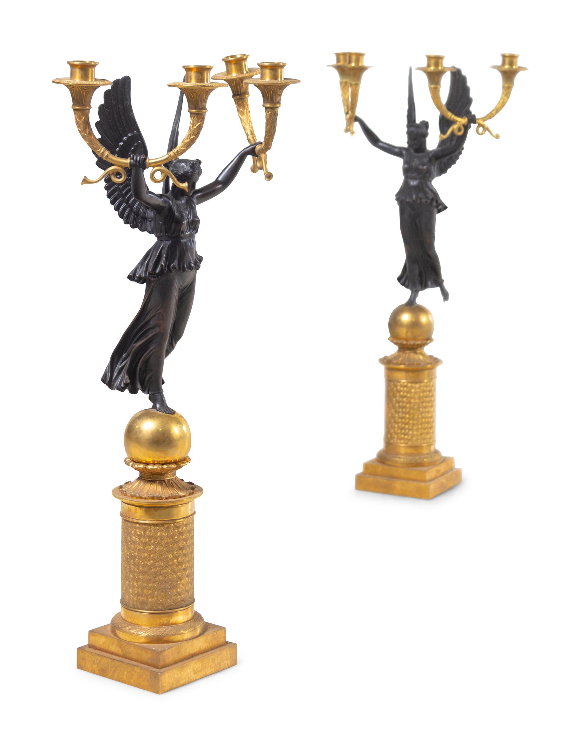 A Pair of Empire Style Gilt and Patinated Bronze Four-Light Candelabra