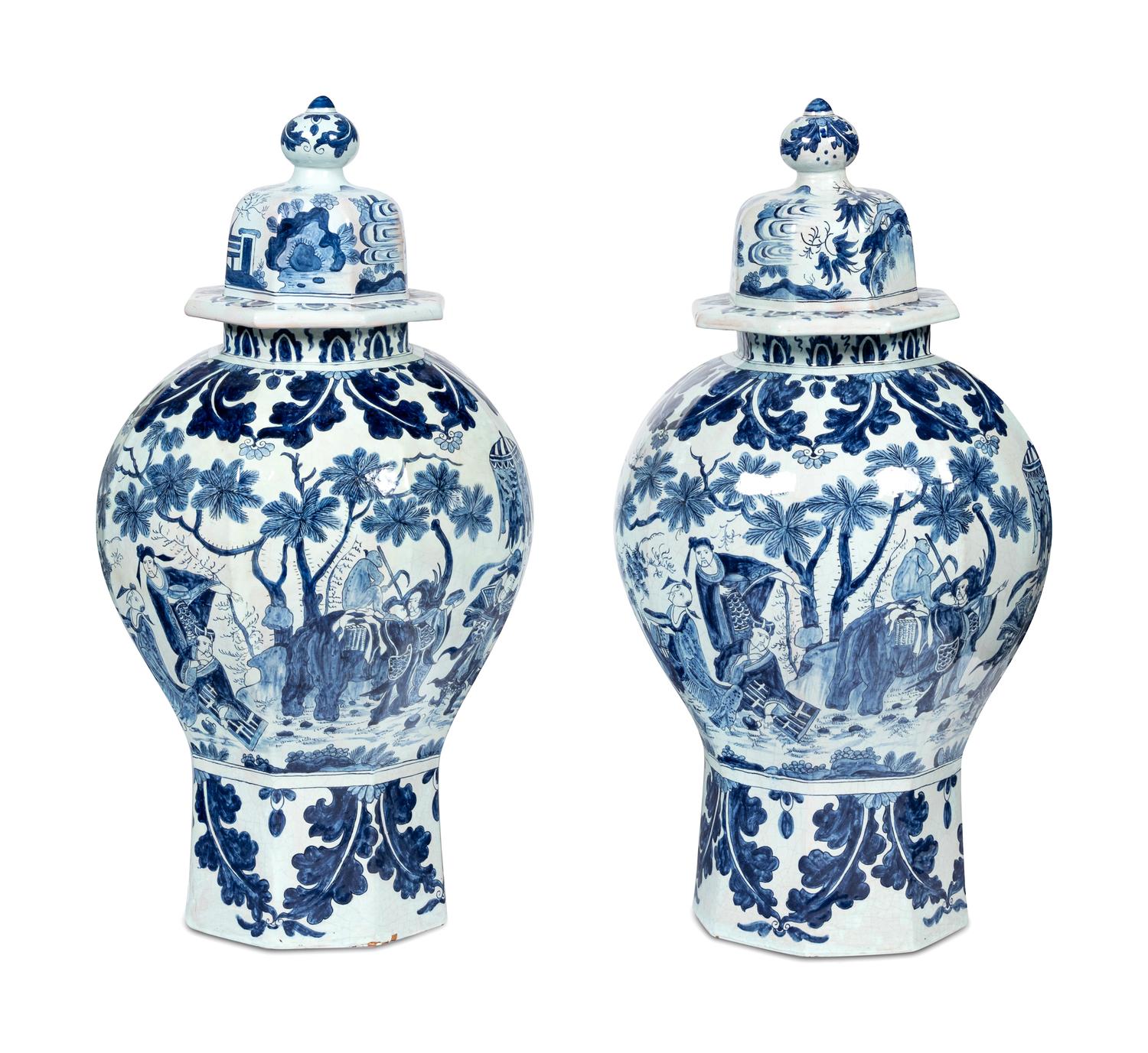 A Pair of Delftware Vases and Covers