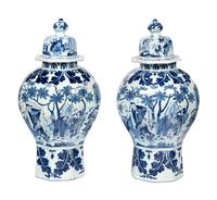 A Pair of Delftware Vases and Covers