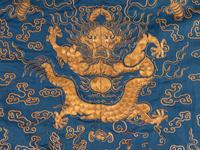 A Blue Ground Embroidered Silk Dragon Robe, Jifu
