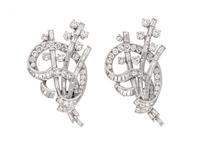 An Art Deco Platinum and Diamond Double Clip Brooch,