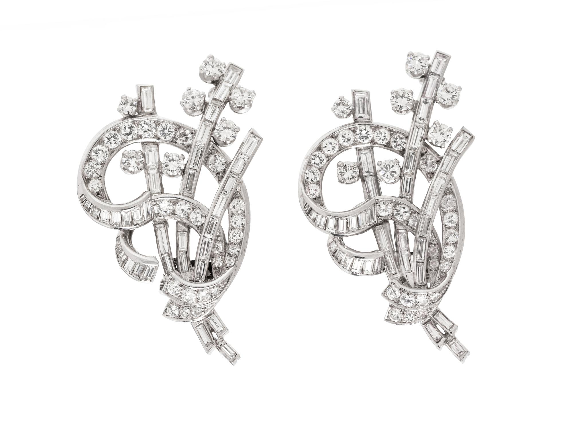 An Art Deco Platinum and Diamond Double Clip Brooch,