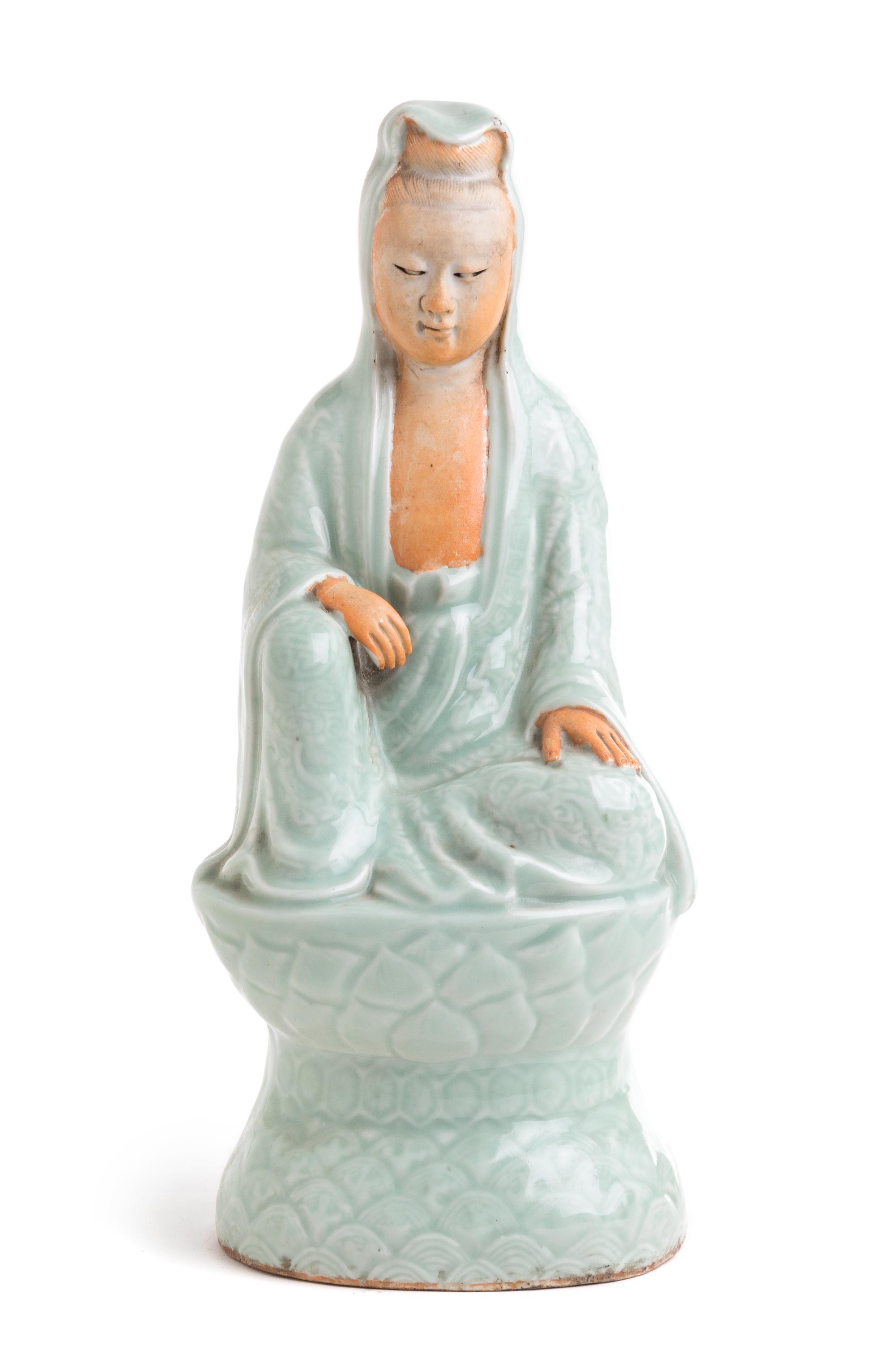 A Celadon Glazed Porcelain Figure of Guanyin Height 12 inches.