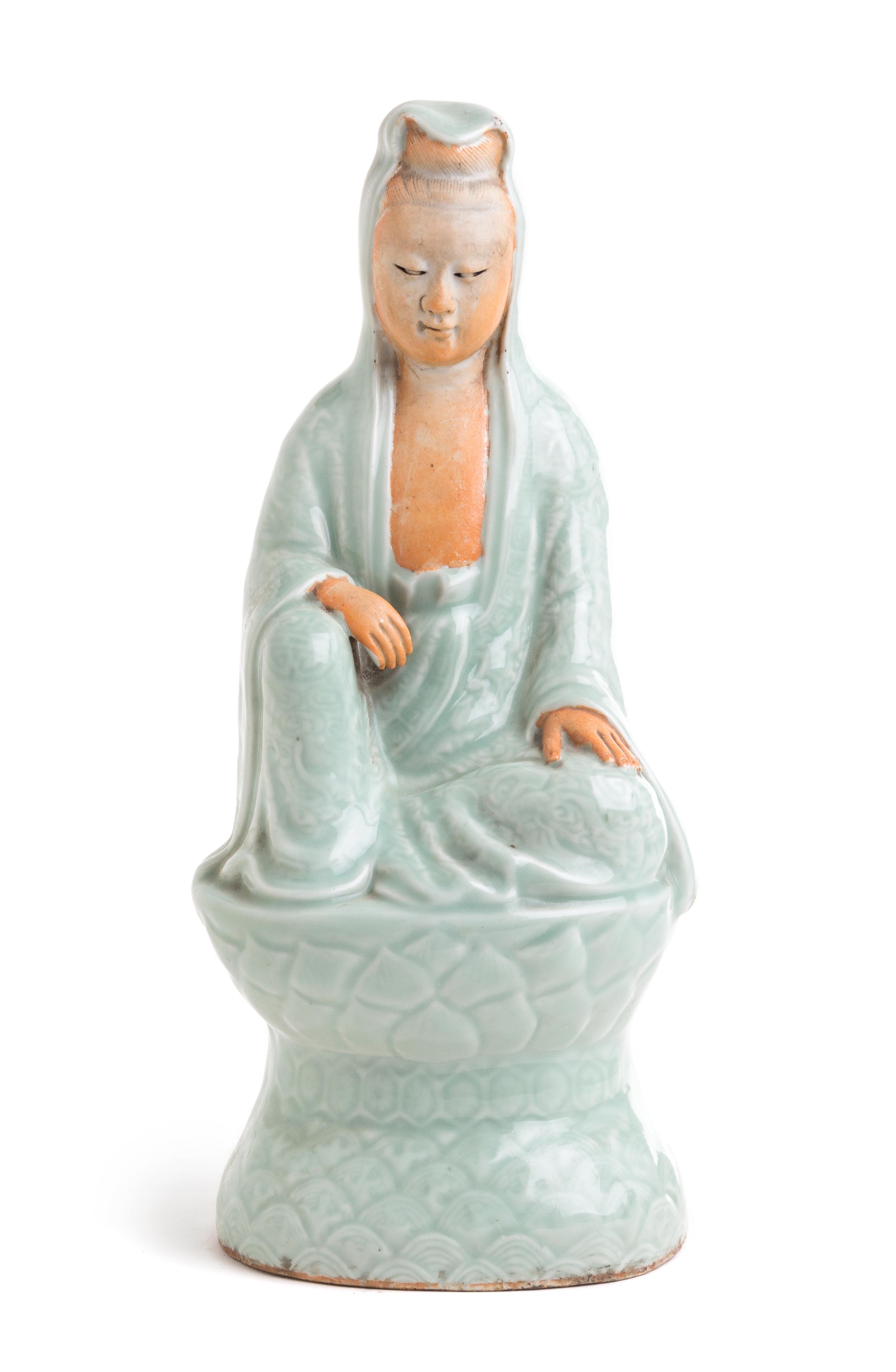 A Celadon Glazed Porcelain Figure of Guanyin Height 12 inches.