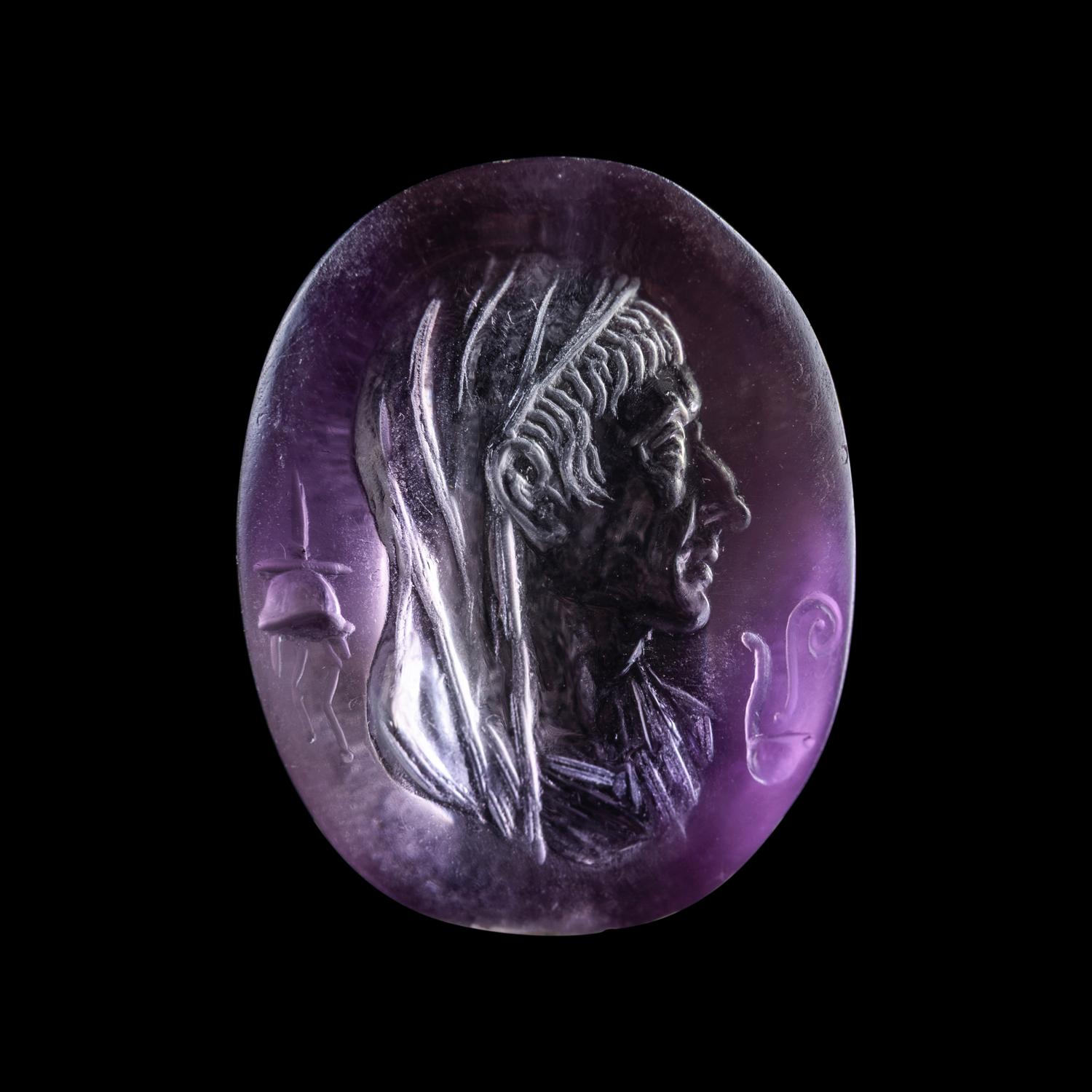 A Roman Amethyst Intaglio with a Portrait Head of a Veiled Man