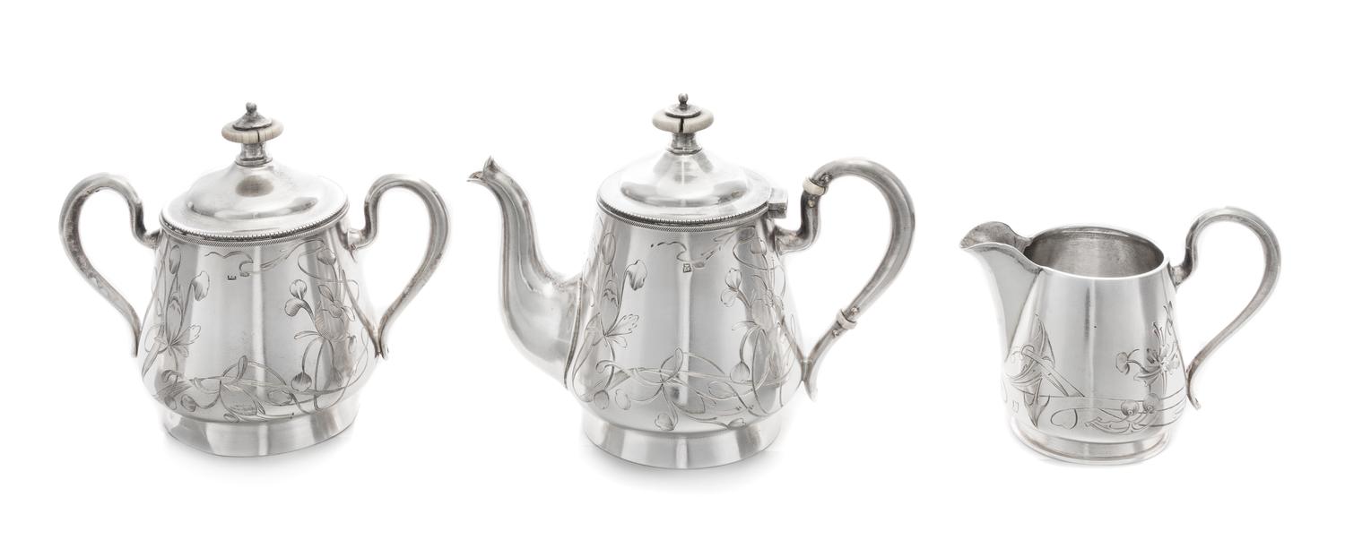 A Russian Silver Diminutive Three-Piece Tea Service, Marks of Antip Kuzmichev and Vasily Iconov, Moscow, Late 19th/Early 20th Century,
