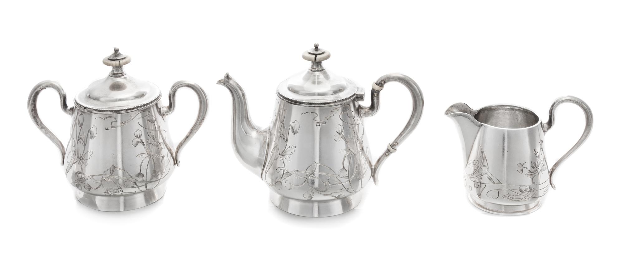 A Russian Silver Diminutive Three-Piece Tea Service, Marks of Antip Kuzmichev and Vasily Iconov, Moscow, Late 19th/Early 20th Century,