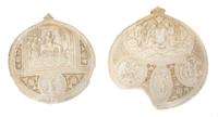 A Pair of Carved Mother-of-Pearl Ornaments Height 6 1/4 inches.