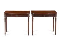 A Pair of George III Mahogany Serpentine Flip-Top Tables