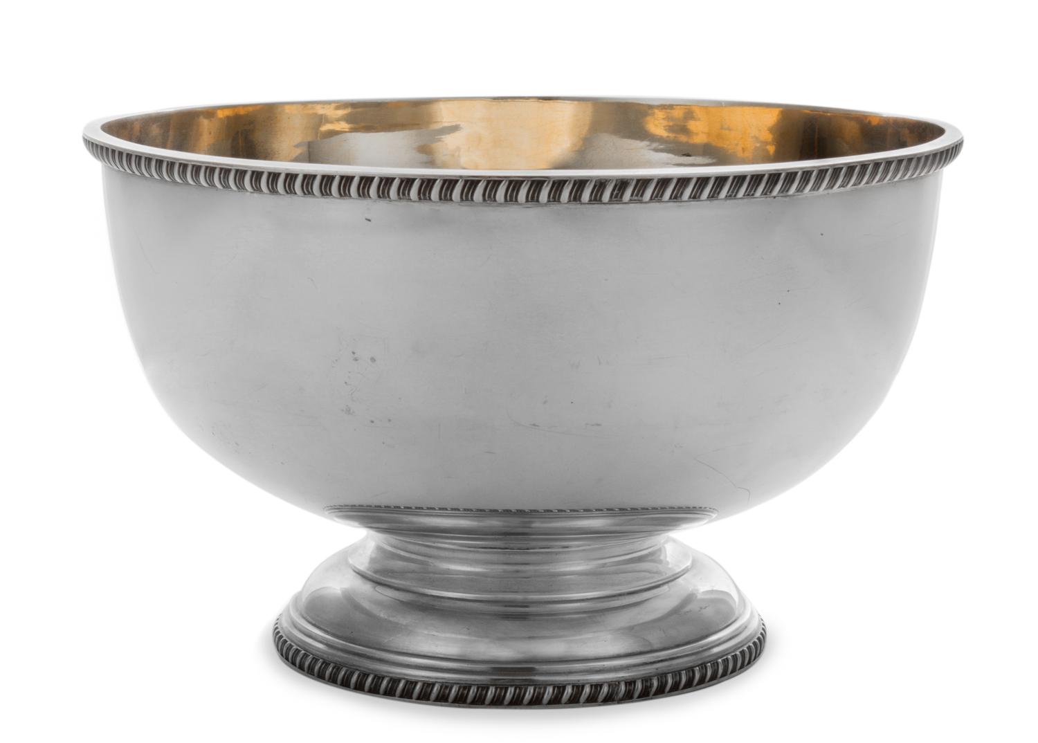 A Victorian Silver Center Bowl, Elkington & Co. Ltd, London, 1896, having a gadrooned rim and a foot with a gilt interior.