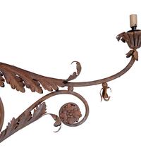 A Pair of Continental Wrought Iron and Tole Sconces