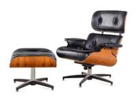 A Faux Leather and Rosewood Lounge Chair and Ottoman in the Style of Eames