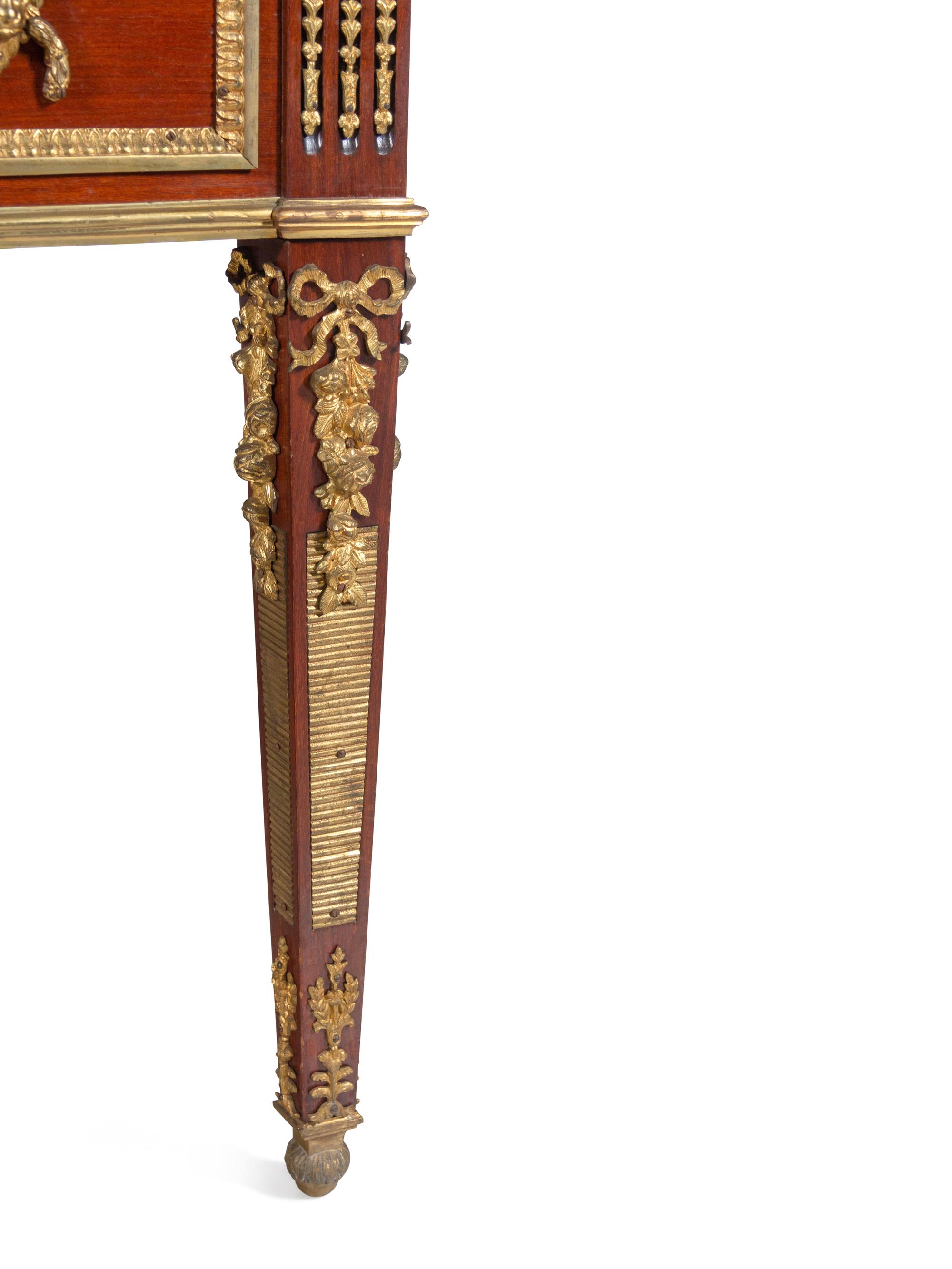 A Louis XVI Style Gilt Bronze Mounted Mahogany Bureau Plat After the Model by Guillaume Benneman