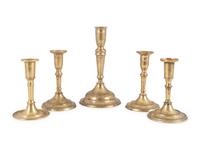 Five English Brass Circular Base Candlesticks
