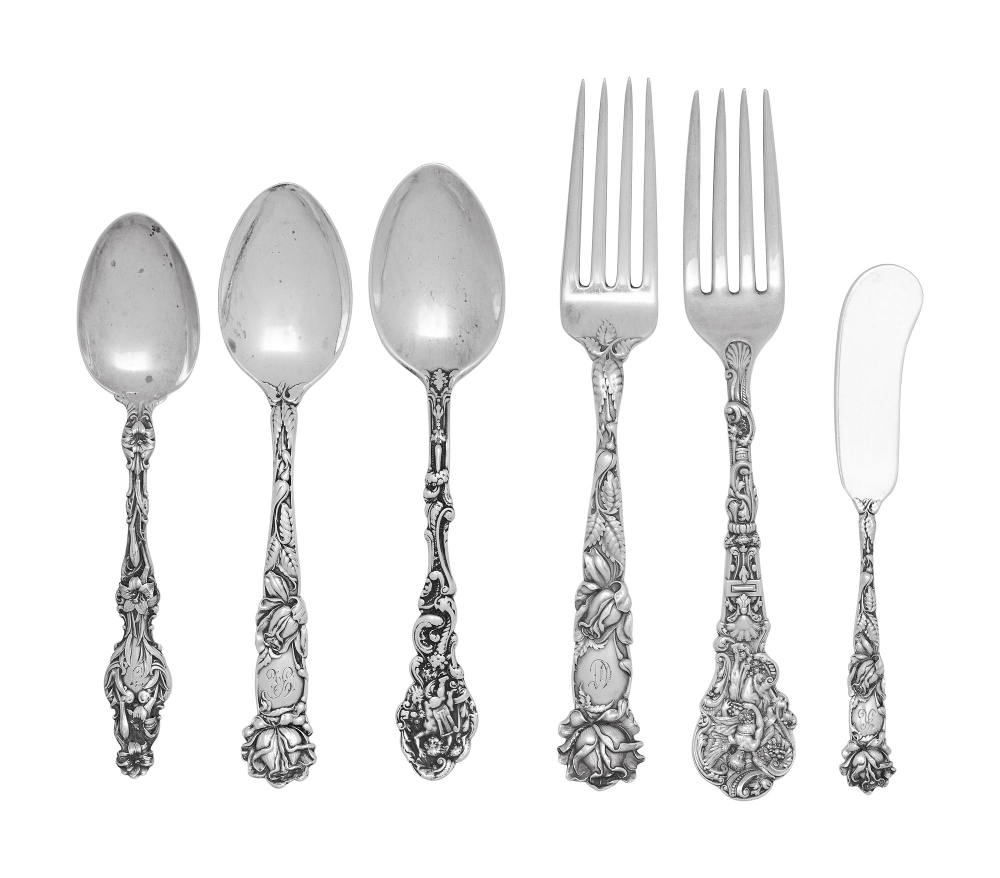 A Collection of American Silver Repoussé Flatware