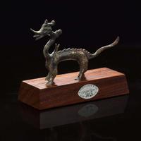 A small Chinese gilt-bronze figure of a striding dragon 铜鎏金行龙 Six dynasties to Tang dynasty ????