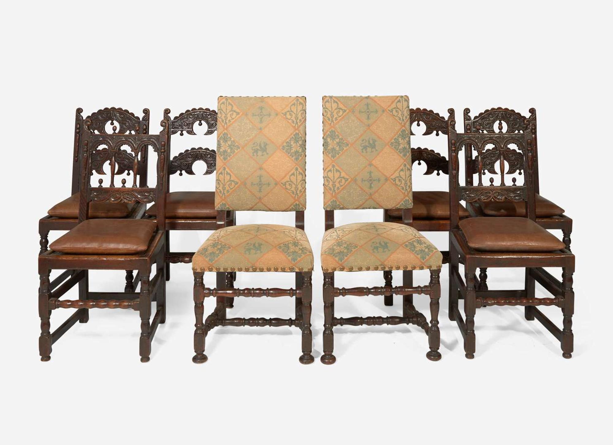 An assembled group of eight Baroque Revival oak and walnut dining chairs, late 19th / early 20th century