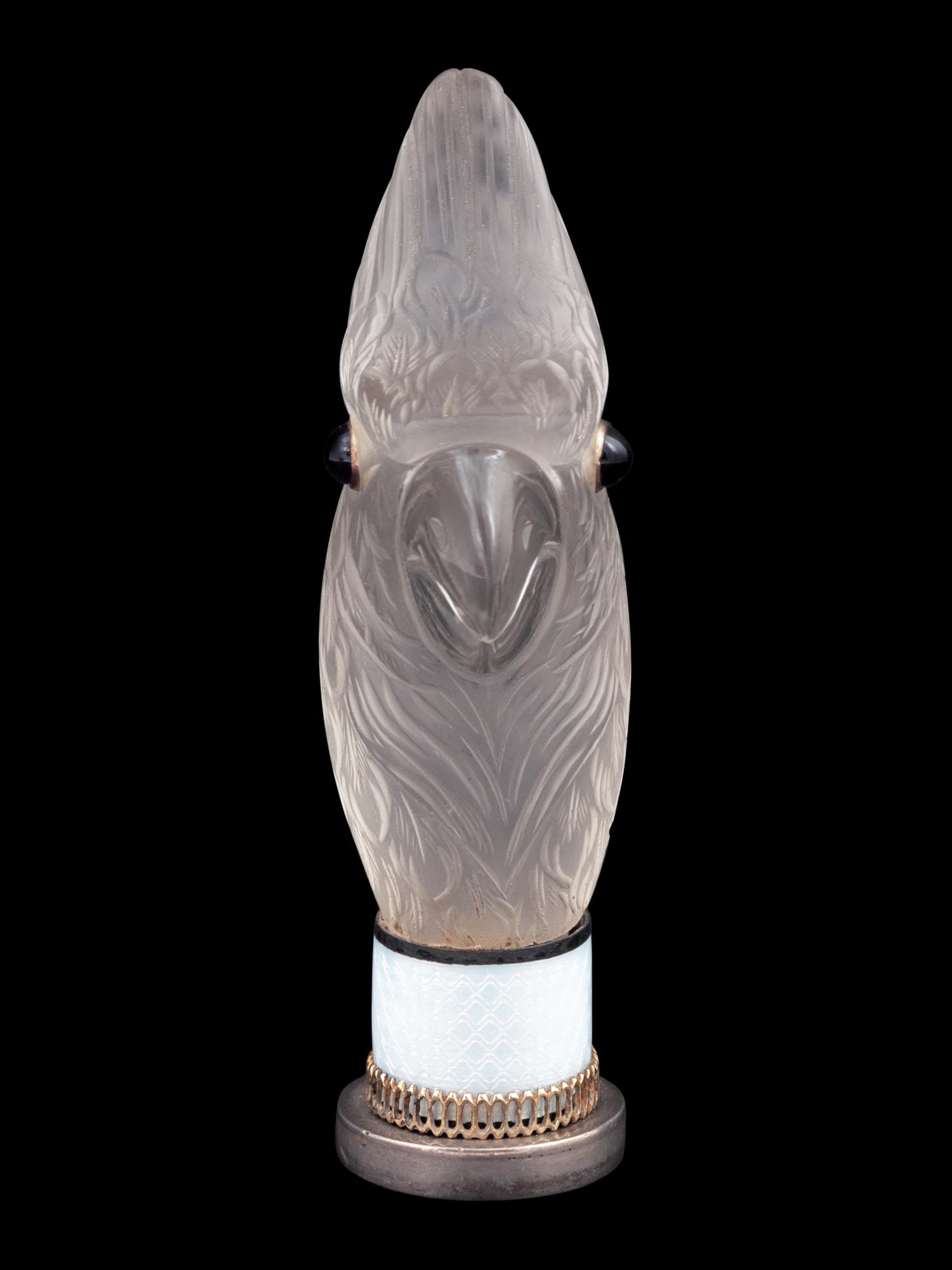 A Continental Carved Rock Crystal and Guilloche Enamel-Mounted Cockatiel-Form Hand Seal