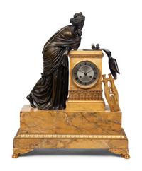 A Large Empire Gilt and Patinated Bronze and Marble Figural Clock