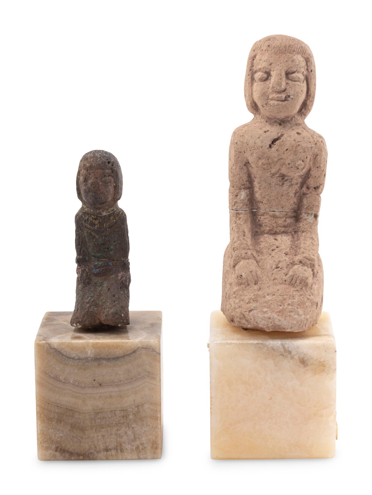 Two Carved Stone Figures