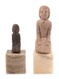 Two Carved Stone Figures