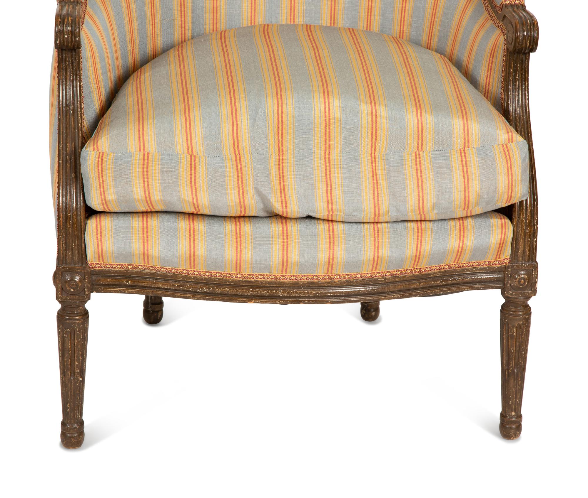 A Pair of Louis XVI Style Faux Finish Bergeres