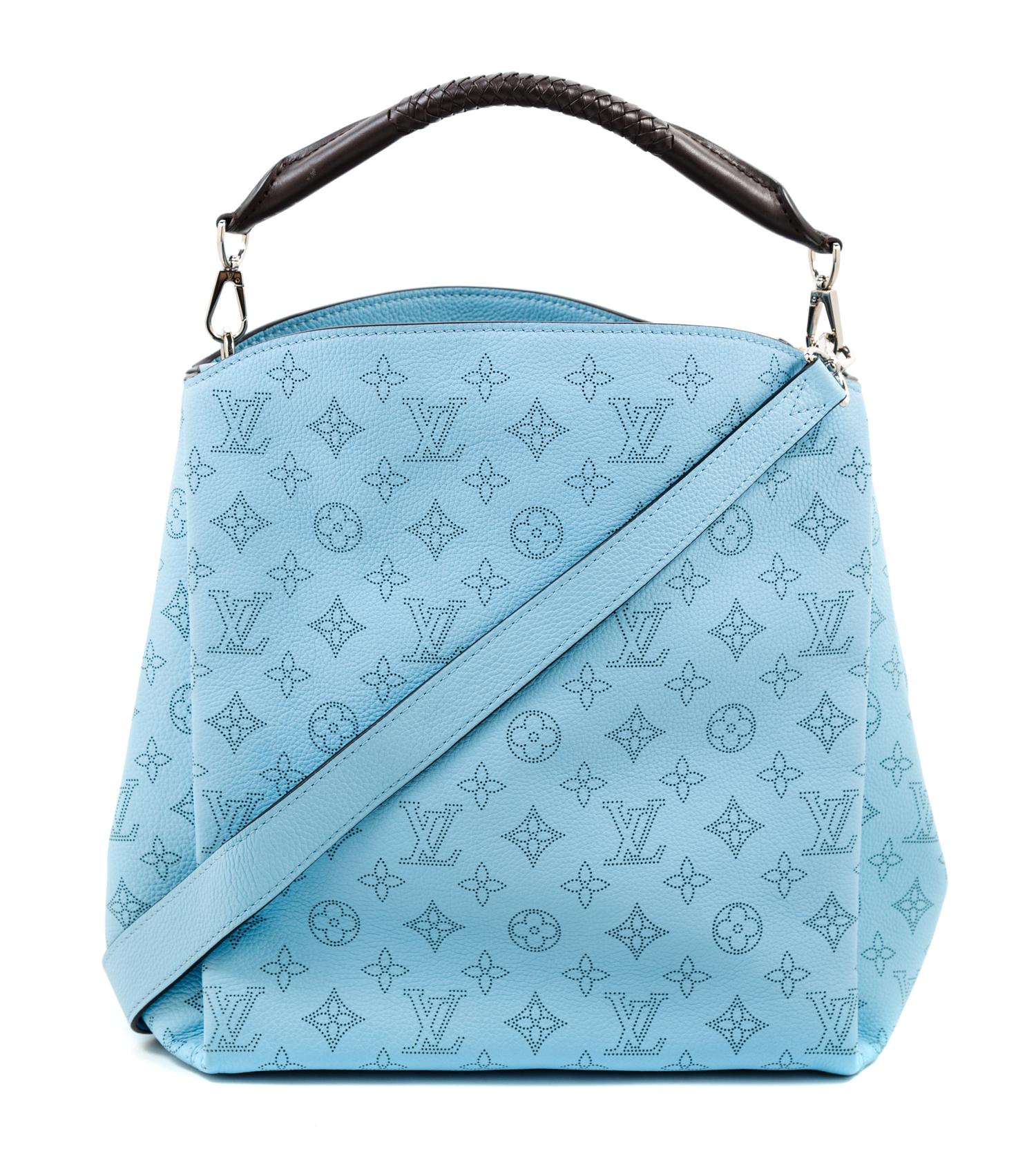 A Louis Vuitton Blue Selene Cross Body Satchel, 11" x 12" x 7"; Handle drop: 4"; Strap drop: 18".