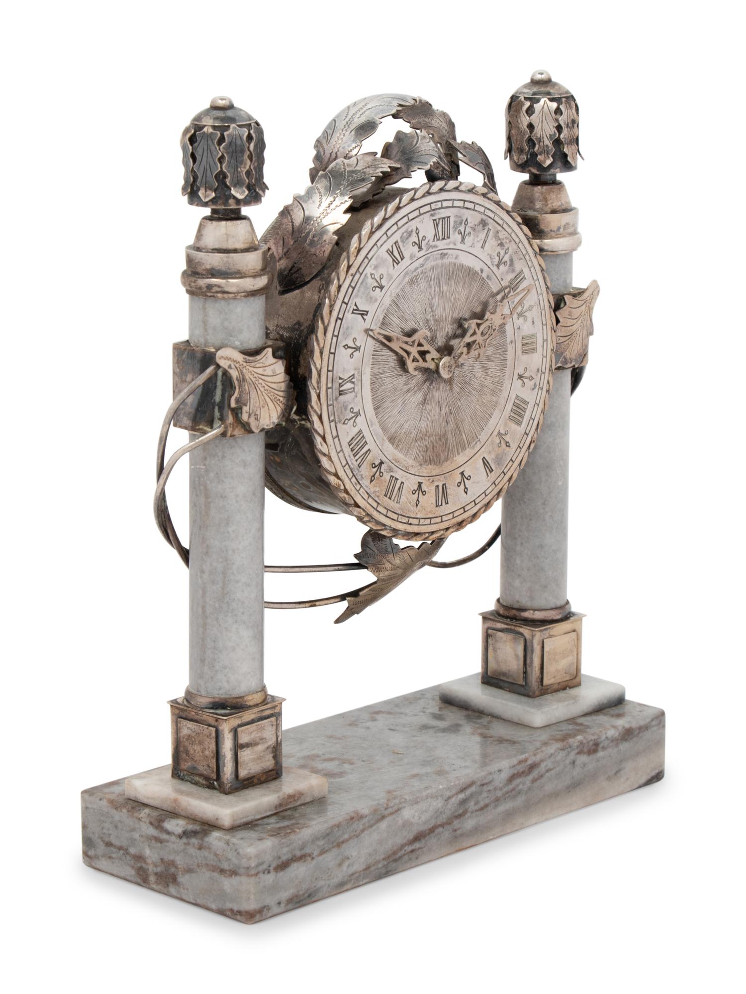 A Continental Silver and Marble Table Clock